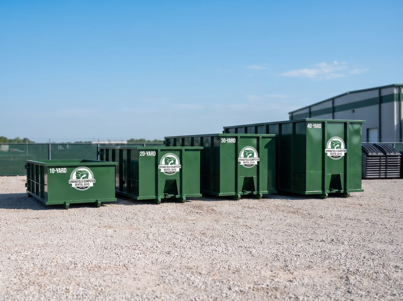Row of 10, 20, 30 and 40 yard roll-off dumpsters lined up, available for rental in Springfield, MO